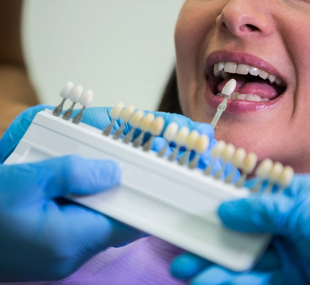 Keeping implants healthy involves dental care similar to that of natural teeth.