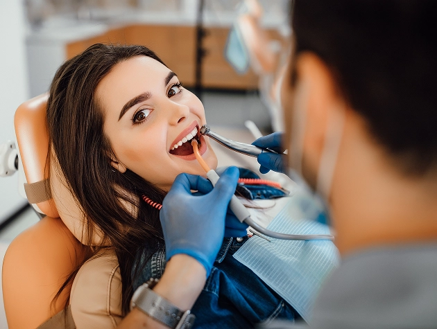 Keeping implants healthy involves dental care similar to that of natural teeth.